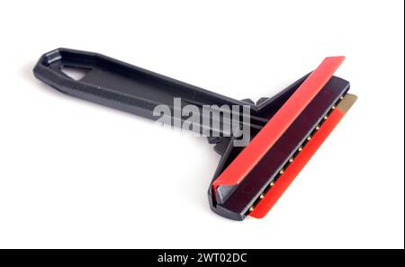 plastic ice scraper in front of white background Stock Photo