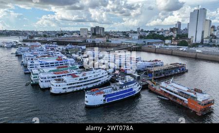 Manaus. 12th Mar, 2024. An aerial drone photo taken on March 12, 2024 shows a cruise ship dock in Manaus, the capital of the state of Amazonas, Brazil. Credit: Wang Tiancong/Xinhua/Alamy Live News Stock Photo