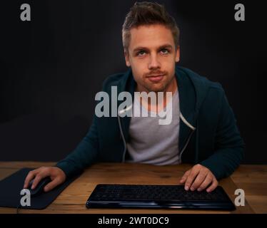Man, keyboard for code and programmer typing, information technology with video game or software development. Internet, computer programming and face Stock Photo