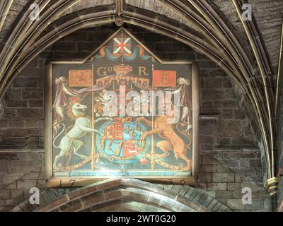 1736 hanoverian british royal emblem, of king George II, on a wall in the christian cathedral of St Giles, Edinburgh, Scotland. Stock Photo