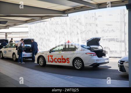 Adelaide airport taxi rank, taxis queue for passengers arriving and departing this domestic and international airport, South Australia Stock Photo