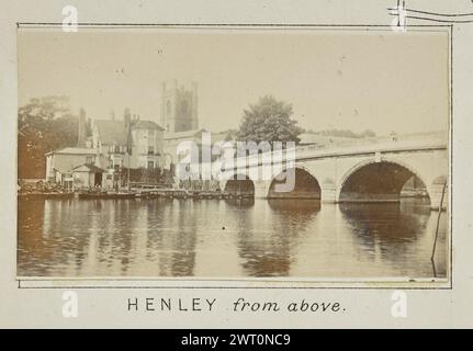 Henley from above. Henry W. Taunt, photographer (British, 1842 - 1922) 1897 One of four tipped-in photographs illustrating a printed map of Henley-on-Thames, Wargrave, and the surrounding area along the River Thames. The photograph shows a view of the arched bridge over the river with the Church of St. Mary the Virgin and surrounding town buildings. (Recto, mount) lower center, below image, printed in black ink: 'HENLEY from above.[italicized]' Stock Photo