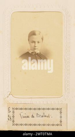 Le Prince de Brabant. Ghémar Frères, photographer (founded 1859, dissolved 1894) about 1865 A portrait of Prince Leopold, Duke of Brabant, as a young boy. (Recto, mount) lower center, black imprinted text: 'GHÉMAR FRÈRES [space] BRUXELLES'; (Verso, mount) upper center, black ink: 'Le Prince de Brabant./No 1022'; lower center, black imprinted text: 'Les Clichés étant conserves indéfiniment/on peut toujours se procurer de nouvelles/epreuves de Cartes & Portraits sans reposer'; (Recto, album page) lower center, below image, black ink on white paper label: 'E/28 [space] Prince de Brabant.'; Stock Photo