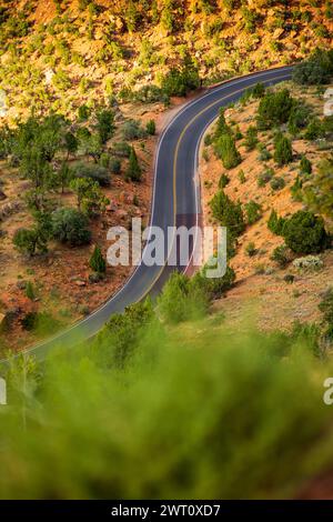 Scenic Springdale Utah mountain road winds through red rock cliff Stock Photo