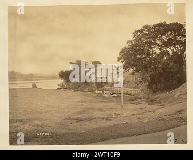 Atzugi. Baron Raimund von Stillfried, photographer (Austrian, 1839 - 1911) 1877–1880 View of several boats tied up at a boatslip on the edge of a lake. Picket fences line the edge of the lake on one side, surrounding buildings perched on the sloping bank. (Recto, print) lower left, handwritten in the negative: 'ATZUGI.'; Lower right, handwritten in the negative: 'ATZ [space] GI' Stock Photo