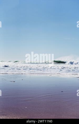 wave breaking on the seashore, high contrast, shadows Stock Photo