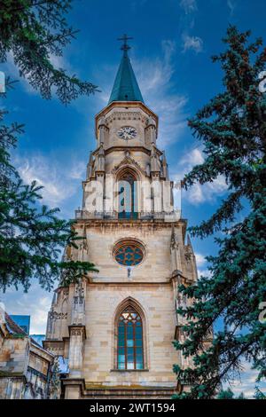 The tower of Roman catholic church of St. Michael in the city center of Cluj-Napoca, Romania. In a Gothic-style, the tower is height of 76 meter, the Stock Photo