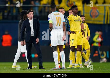 Villarreal, Spain. 14th Mar, 2024. Villarreal CF head coach Barcelona Garcia Toral greets Geoffrey Kondogbya of Olympique Marseille at full time during the UEFA Europa League match, Round of 16, second leg, between Villarreal CF and Olympique Marseille played at La Ceramica Stadium on March 14, 2024 in Villarreal, Spain. (Photo by Sergio Ruiz/PRESSINPHOTO) Credit: PRESSINPHOTO SPORTS AGENCY/Alamy Live News Stock Photo