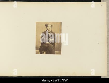 Portrait of young man. Sir John Joscelyn Coghill, photographer (Irish, 1826 - 1905) about 1850s A portrait of a young man. He is seated with his arms and legs crossed. (Recto, mount) upper right, pencil: '60'; Stock Photo