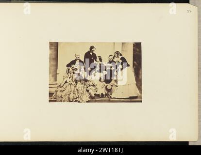 Group portrait. Sir John Joscelyn Coghill, photographer (Irish, 1826 - 1905) about 1850s A group portrait of men, women, and children gathered on a set of steps. Most of the group is seated. One man and one woman are standing. (Recto, mount) upper right, pencil: '23'; Stock Photo