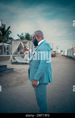 Headshot of successful smiling cheerful african american businessman executive stylish company leader. Cheerful young bearded african american man man Stock Photo
