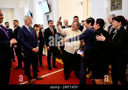 Prague, Czech Republic. 15th Mar, 2024. A participant of the Czech-Philippine Business Forum takes a selfie with Czech President Petr Pavel (left) and Philippine President Ferdinand Marcos (third from right) in Prague, Czech Republic, March 15, 2024. Credit: Roman Vondrous/CTK Photo/Alamy Live News Stock Photo