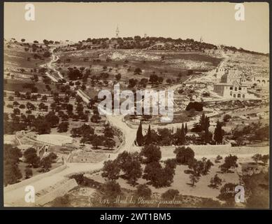 Mont des Oliviers, Jerusalem. Félix Bonfils, photographer (French, 1831 - 1885) 1867–1870 A terraced hillside with dirt roads and scattered olive trees, with stone buildings to the right and a walled enclosure in the foreground. (Recto) lower center, inscribed on the negative: '292 - Mont des Olivers - Jérusalem' (Verso) lower left, in pencil: 'L52.24 (Bon)' upper right, in black ink: 'The garden of Gethsemaine is the/ small walled in inclosure [sic] in the/ foreground.' [sideways] Stock Photo