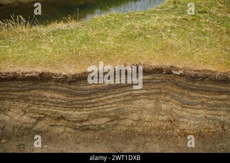 Marsh soil with turf at a tide way, Denmark, Mandoe Stock Photo