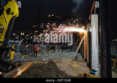 flying sparks on a construction site, Germany, North Rhine-Westphalia Stock Photo