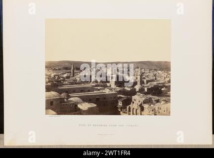 Pool of Hezekiah from the Citadel. John Cramb, photographer (Scottish, active 1850s - 1860s) 1860 Elevated view of Jerusalem, with Hezekiah's Pool in the foreground, from the Tower of David. The domes of the Church of the Holy Sepulchre are visible between the minarets of the Mosque of Omar and the Khanqah al-Salahiyya. (Recto, mount) lower left, below print, letterpress in black ink: 'Cramb, Photo. 1860.' Lower center, letterpress in black ink: 'POOL OF HEZEKIAH FROM THE CITADEL.' 'William Collins, Glasgow.' (Verso, mount) lower left, handwritten in pencil: 'IB 51.20 (CRA)' Stock Photo