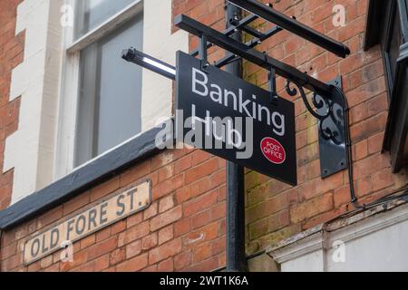 Sign outside a new Post Office banking hub nearing completion in Sidmouth, Devon. High Street banks continue to close in smaller towns Stock Photo
