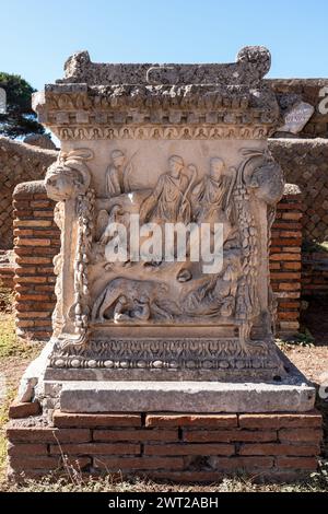 Close-up on decorative sculptures carved on ancient roman marble sarcophagus Stock Photo