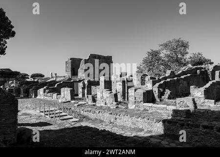 Black and white photo of ruins at archaeological park in Ancient Ostia Stock Photo