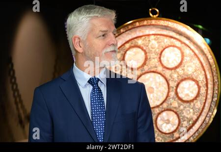 Dresden, Germany. 15th Mar, 2024. Petr Pavel, President of the Czech Republic, stands in front of a basin with mother-of-pearl inlays from the Sultanate of Gujarat (now India) from before 1598 before the opening of the exhibition 'Fragments of Memory - the Treasure of St. Vitus Cathedral in Prague' in the Kunsthalle Lipsius-Bau. The visit focuses on neighborly relations between Saxony and the Czech Republic and economic and cultural cooperation. Credit: Robert Michael/dpa/Alamy Live News Stock Photo