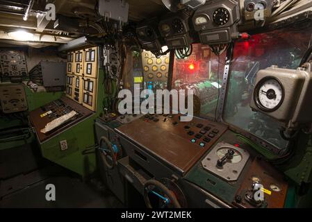 Interior of old battle ship's engine room control compartment. Stock Photo