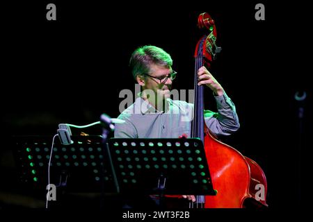 Hervé Jeanne, bassist of The Manhattan Transfer, during the concert at the Pomigliano Jazz Festival, in the Roman amphitheater of Avella. Stock Photo