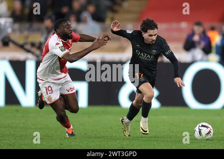 Monaco, Monaco. 1st Mar, 2024. Vitinha of PSG brushes off a challenge from Youssouf Fofana of AS Monaco during the Ligue 1 match at Stade Louis II, Monaco. Picture credit should read: Jonathan Moscrop/Sportimage Credit: Sportimage Ltd/Alamy Live News Stock Photo