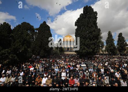 Muslims attend first Friday prayers during the Muslim holy fasting ...