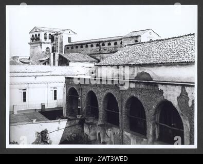 Campania Caserta Aversa S. Francesco. Hutzel, Max 1960-1990 Post-medieval: Built in 6th century, remodelled in 1645 and 1830. Lower part of the campanile belongs to the original construction. Interior has series of works in the Francesco de Mura school; 'Adoration of the Shepherds' by Pietro da Cortona c. 1650; 'Ecstasy of S. Francesco' by Ribera, 1649; 'Madonna and Child' Byzantine 13th century. Attached is a medieval cloister with fragments of frescoes. Object Notes: TCI states that in 1980 plans were afoot to create a small museum in the monastery to house sculpture, paintings, and other wo Stock Photo