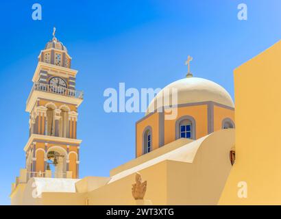 The beautiful clock tower of the Cathedral of St. John the Baptist in Fira, Santorini. Stock Photo