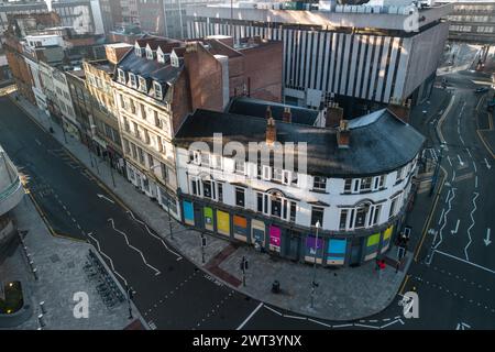 Station Street, Birmingham, March 4th 2024 - The Crown pub, opposite New Street station in Birmingham, England which is described as ‘The birthplace of Metal' where Black Sabbath played their first gig has been given Grade II listed status. Station Street where the pub is located was under threat being redeveloped and bulldozed as another property on the street, Britain's oldest cinema, The Electric also closed down Credit: Stop Press Media/Alamy Live News Stock Photo