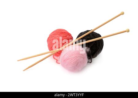 Multi-colored balls and knitting needles isolated on a white background. Stock Photo