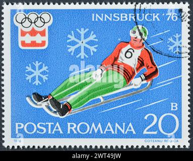Cancelled postage stamp printed by Romania, that shows Luge, Winter Olympic Games 1976 - Innsbruck, circa 1976. Stock Photo