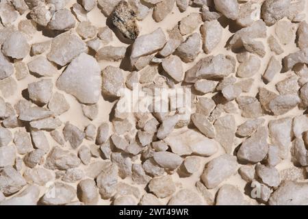 Concrete wall is finished with granite chips Stock Photo