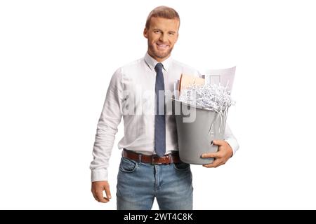 Office worker holding a bin with paper waste isolated on white background Stock Photo