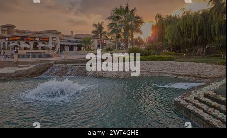 South park Madinaty in Second new Cairo, Egypt with plenty of delicious restaurants and dining options, beautiful forest lakes, and a theme park. Stock Photo