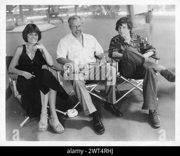 Film Director STEVEN SPIELBERG with Producer JULIA PHILLIPS and Technical Consultant and UFO expert  Dr. J. ALLEN HYNEK during the making of CLOSE ENCOUNTERS OF THE THIRD KIND 1977 Cinematography VILMOS ZSIGMOND Music JOHN WILLIAMS Columbia Pictures Stock Photo