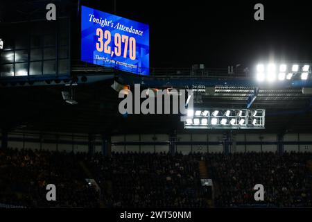 London, UK. 13th Mar, 2024. A screen shows the attendance during the Chelsea FC Women v Arsenal Women FC Women's Super League match at Stamford Bridge, London, England, United Kingdom on 15 March 2024 Credit: Every Second Media/Alamy Live News Stock Photo