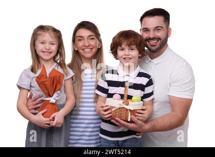 Easter celebration. Happy family with wrapped egg and wicker basket isolated on white Stock Photo