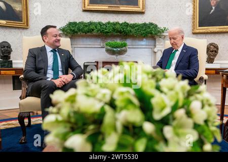 Washington, Vereinigte Staaten. 15th Mar, 2024. United States President Joe Biden meets with Ireland's Taoiseach Leo Varadkar in the Oval Office of the White House in Washington, DC, Friday, March 15, 2024. Credit: Nathan Howard/Pool via CNP/dpa/Alamy Live News Stock Photo