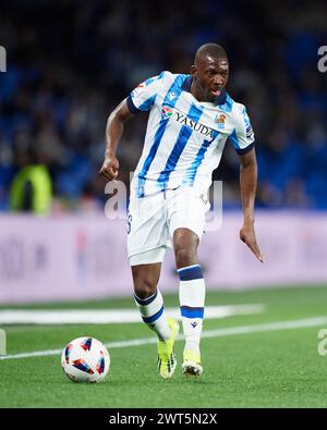 Hamari Traore of Real Sociedad with the ball during the LaLiga EA Sports match between Real Sociedad and Cadiz CF at Reale Arena Stadium on March 15, 2024, in San Sebastian, Spain. Credit: Cesar Ortiz Gonzalez/Alamy Live News Stock Photo