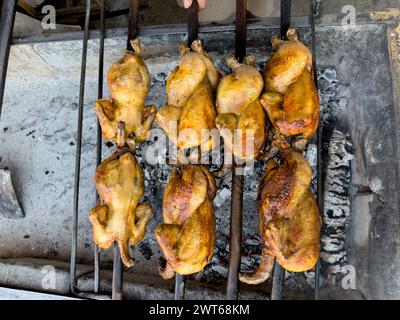 Balochi chicken sajji bar b que on charcoal Stock Photo