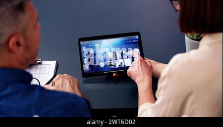 Smart House CCTV Security Camera App On Laptop Stock Photo
