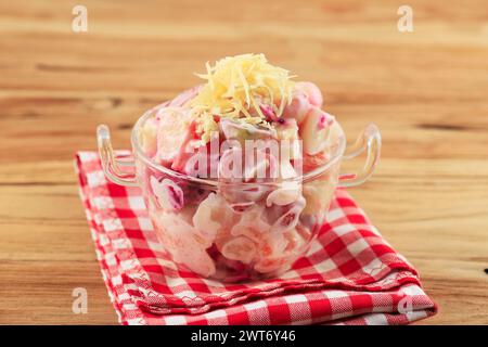 Indonesian Fruit Salad with Shredded Cheese Topping, Salad Buah with Mayonnaise, Keju,  and Yoghurt Dresiing Stock Photo