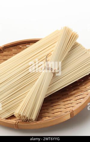 Japanese Korean Dried Somen on Bamboo Plate Stock Photo