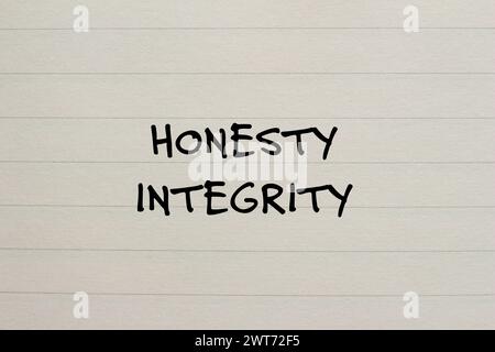 Honesty and integrity words written on notepad page. Conceptual symbol. Copy space. Stock Photo