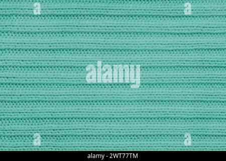 Jersey textile background , turquoise striped knitted fabric. Woolen knitwear, sweater, pullover surface texture, textile structure, cloth surface, we Stock Photo