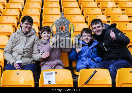 Wolverhampton Wanderers fans with a homemade tinfoil FA Cup ahead of the Emirates FA Cup Quarter- Final match Wolverhampton Wanderers vs Coventry City at Molineux, Wolverhampton, United Kingdom, 16th March 2024  (Photo by Gareth Evans/News Images) Stock Photo