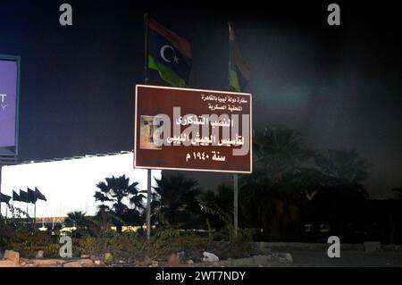 Giza, Egypt, March 15 2024: The monument to the founding of the Libyan army 1940 in Giza city of Egypt at night, Monument of foundation of military ar Stock Photo