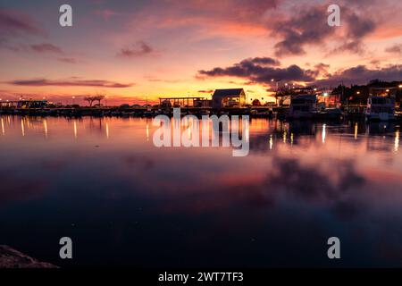 Travel Portugal Algarve interesting places View of the fishing port and the town of Fuseta at dusk Stock Photo